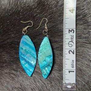 Turquoise colored shell earrings dangles